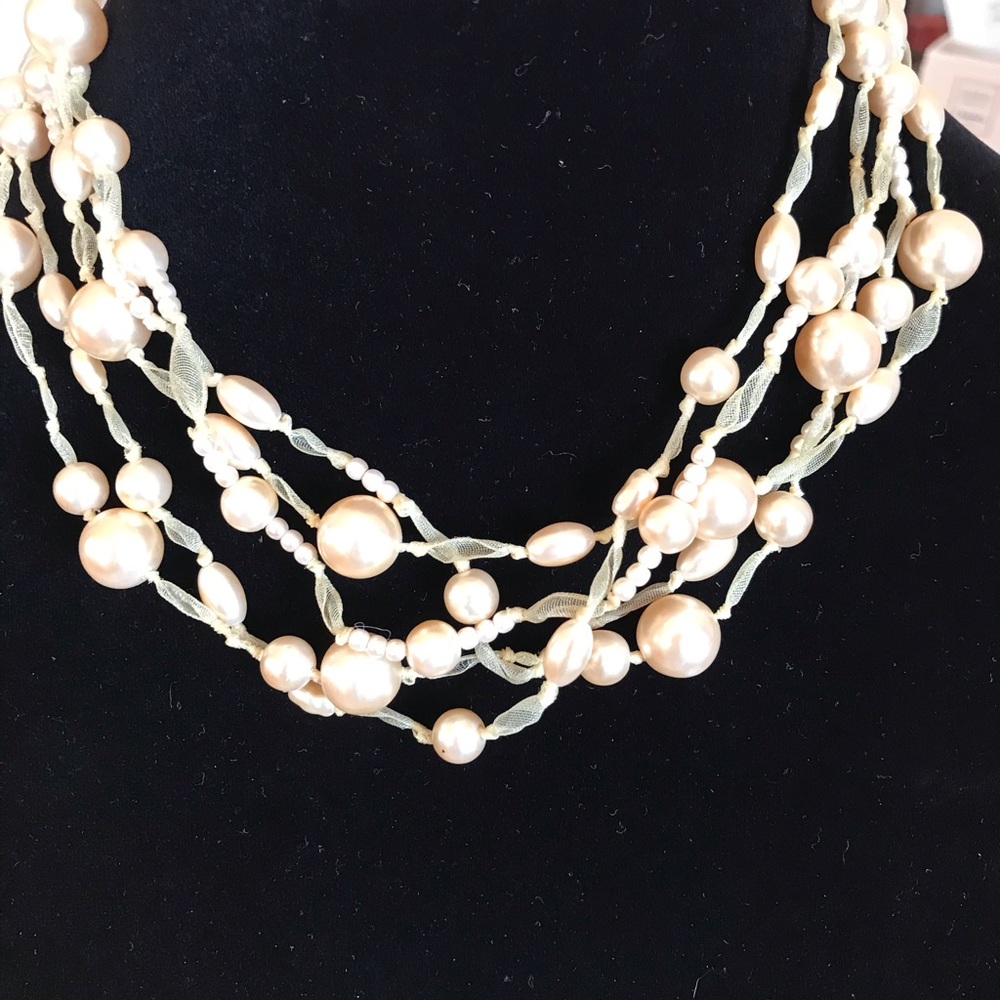 Faux pearl choker.